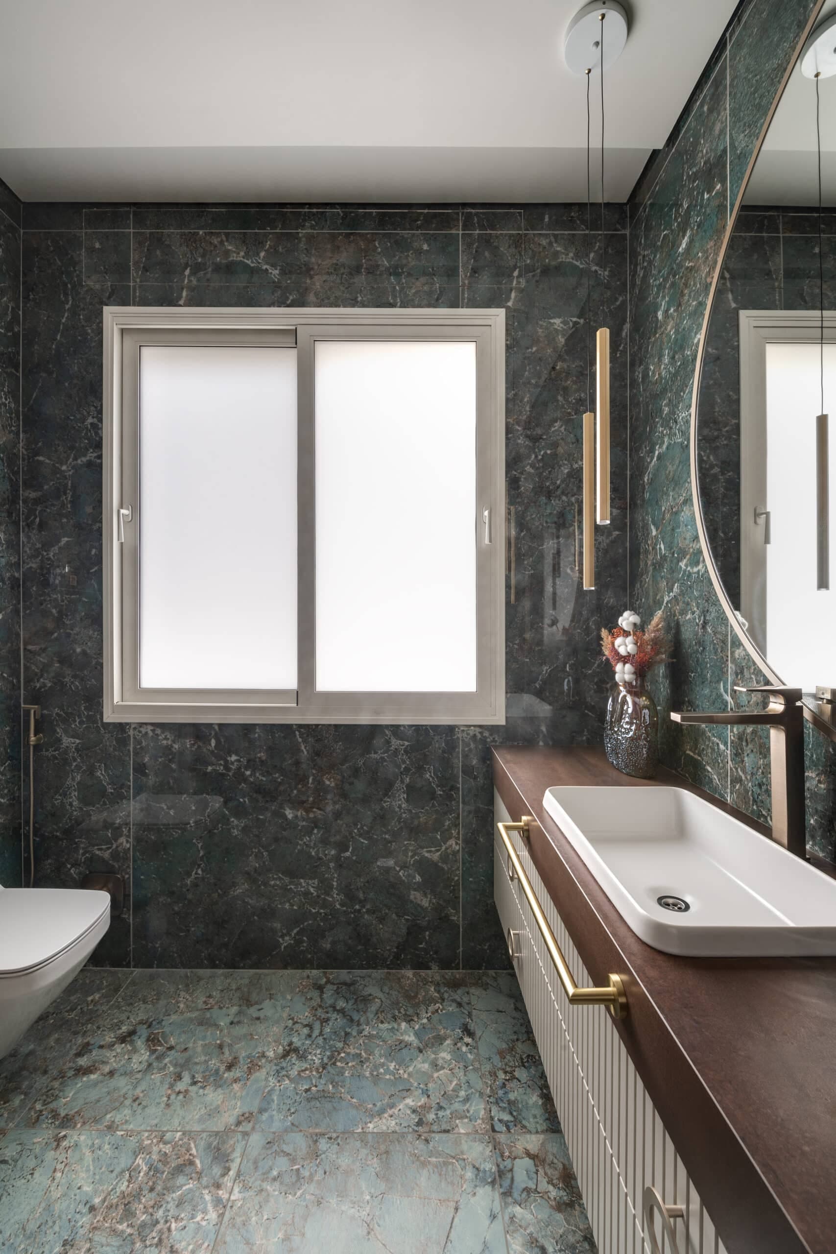 Large format kitchen backsplash and countertop installation