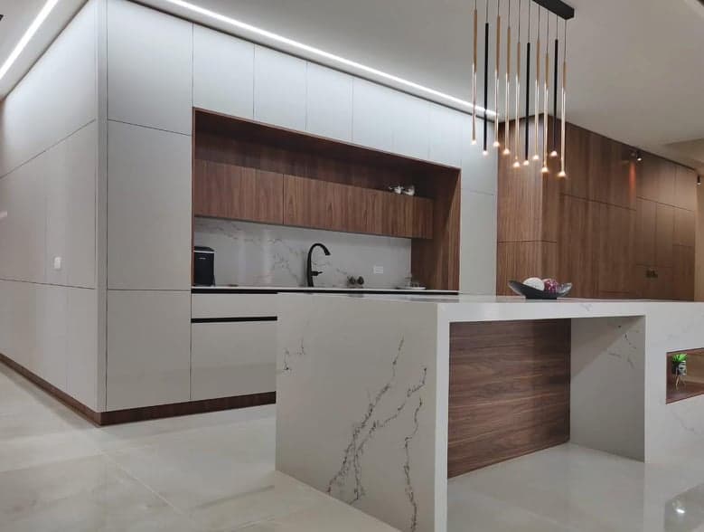 Contemporary kitchen with dark stone finishes