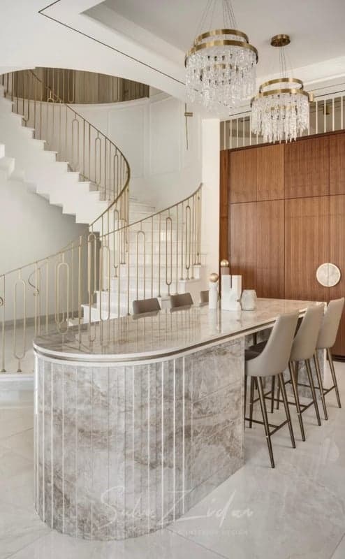 Stair and bar area with custom stone surfaces